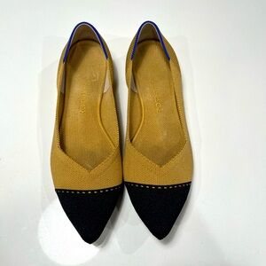 Rothy’s beige and black pointy flat